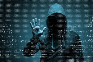 hacker breaching cyber security